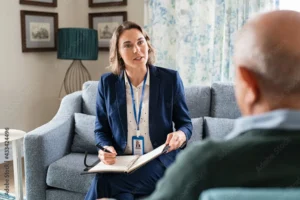 8-signs-its-time-for-in-home-nursing-care healthcare professional talking to elderly man