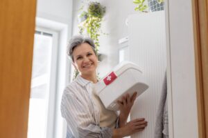 Preparing-for-an-Emergency senior woman holding emergency kit