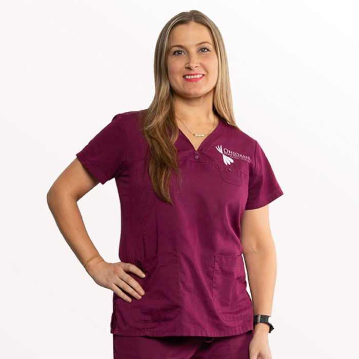 Woman wearing Ohioans Home Healthcare uniform posing for photo. Click for home health jobs.